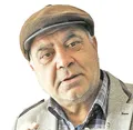 بست پایین خیابان بهترین زمینه برای دوربین خلیل عکاس بود