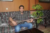 حکاکی نام موسی&zwnj;الرضا(ع) روی مس و چوب