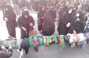 «علم‌بندان» آیین‌ زنان محله طبرسی‌شمالی در محرم است